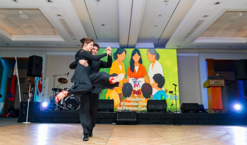 Linda Robledo and David Chartoriski performing a ballroom dance at the FWA-UK Philippine National Day Gala 2026